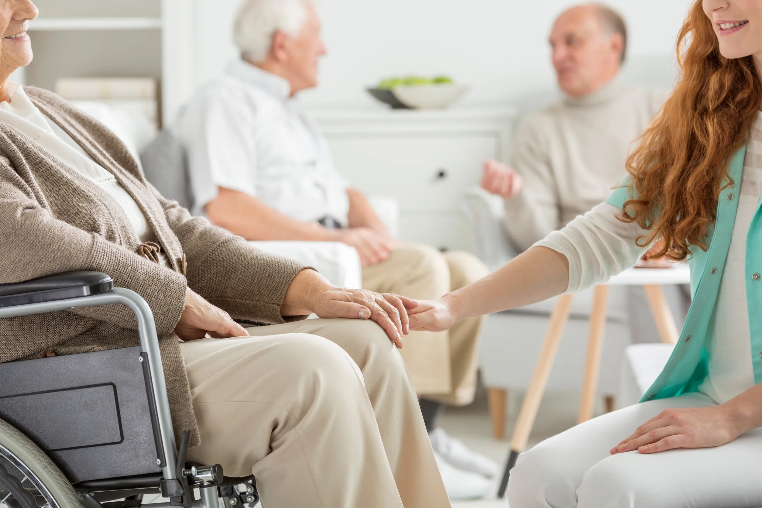 Nurse supporting the charge at nursing home